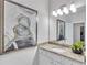 Bathroom featuring a granite-topped vanity with a bowl sink and decorative wall art at 6179 Ashbranch Dr, Acworth, GA 30101