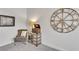 A well-decorated wall with a vintage radio and clock adds character to the living space at 6179 Ashbranch Dr, Acworth, GA 30101