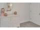 Bedroom dresser with decor and a decorative mirror on the wall at 6179 Ashbranch Dr, Acworth, GA 30101