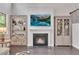 Living room boasts a fireplace and custom shelving at 6179 Ashbranch Dr, Acworth, GA 30101