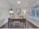 Bright and airy office space with a modern desk, ample natural light, and stylish decor at 6179 Ashbranch Dr, Acworth, GA 30101