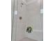 Modern tiled shower with a rainfall showerhead and a corner plant shelf at 6179 Ashbranch Dr, Acworth, GA 30101