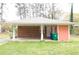 Brick house featuring a large carport and storage room at 1693 Montreal Rd, Tucker, GA 30084