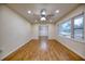 Open-concept living area featuring stylish laminate floors, recessed lighting, and ample space at 1693 Montreal Rd, Tucker, GA 30084