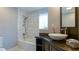 Elegant bathroom with a soaking tub and stylish vanity at 1978 Fisher Trl, Atlanta, GA 30345