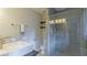 Modern bathroom featuring sleek fixtures and a glass shower enclosure at 1978 Fisher Trl, Atlanta, GA 30345