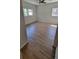 Bright bedroom featuring hardwood floors, natural light, and neutral walls at 1978 Fisher Trl, Atlanta, GA 30345