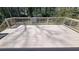 Spacious, freshly-stained wooden deck with open railing perfect for outdoor entertaining at 1978 Fisher Trl, Atlanta, GA 30345