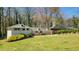 Charming home with lush landscaping and a well-manicured lawn at 1978 Fisher Trl, Atlanta, GA 30345