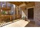 Spacious wooden deck area, perfect for outdoor gatherings, with brick siding at 2006 Towneship Trl, Roswell, GA 30075