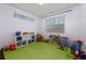 Bright playroom area with ample storage and natural light at 2006 Towneship Trl, Roswell, GA 30075