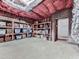 Spacious unfinished basement featuring concrete floors and walls for storage, and open ceiling with visible insulation at 414 Candler Trl, Canton, GA 30115
