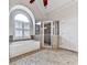 Bathroom featuring a soaking tub, glass-enclosed shower, and tile flooring at 414 Candler Trl, Canton, GA 30115