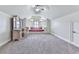 Spacious bonus room bedroom featuring a window seat and neutral carpet at 414 Candler Trl, Canton, GA 30115