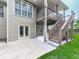 Lower level patio with access to a multi-story deck and expansive green backyard at 414 Candler Trl, Canton, GA 30115