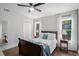 Cozy bedroom with natural light, wood floors, and charming decor at 4469 Huntington Cir, Atlanta, GA 30338