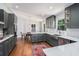 Stylish kitchen boasts gray cabinetry, stainless steel appliances, and ample counter space at 4469 Huntington Cir, Atlanta, GA 30338