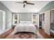 Bright main bedroom with modern decor, large closet, and ample natural light at 4469 Huntington Cir, Atlanta, GA 30338