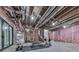 Large unfinished basement featuring pink insulation, and exposed ceiling at 106 Belmont Dr, Canton, GA 30115