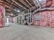 Unfinished basement featuring pink insulated walls and exposed ceiling at 106 Belmont Dr, Canton, GA 30115