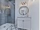 Bathroom featuring glass-enclosed shower and decorative tile floor at 106 Belmont Dr, Canton, GA 30115