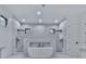 Luxurious bathroom featuring a freestanding tub, marble walls, and dual walk-in showers at 106 Belmont Dr, Canton, GA 30115
