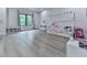 room featuring plenty of floor space and natural light for play and relaxation at 106 Belmont Dr, Canton, GA 30115