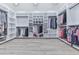 Walk-in closet with custom shelving and ample storage space for clothes and accessories at 106 Belmont Dr, Canton, GA 30115