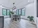 Dining room with lots of natural light and views of the forest at 106 Belmont Dr, Canton, GA 30115