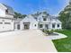 Beautiful modern farmhouse with manicured lawn and long driveway at 106 Belmont Dr, Canton, GA 30115