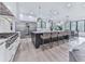 A gourmet kitchen featuring professional stainless steel appliances and large island at 106 Belmont Dr, Canton, GA 30115