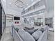 Open concept living room with sleek fireplace and staircase at 106 Belmont Dr, Canton, GA 30115