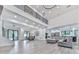 Spacious open-concept area showcasing modern stairs, dining, living, and kitchen spaces at 106 Belmont Dr, Canton, GA 30115