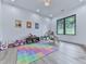 Large playroom featuring a black window at 106 Belmont Dr, Canton, GA 30115