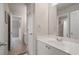 Bathroom with a single sink vanity, white doors, tiled floor and walk in shower at 1758 Rosehedge Nw Way, Kennesaw, GA 30152