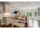 Gourmet kitchen with stainless appliances, custom cabinets, granite countertops, and a large center island at 1758 Rosehedge Nw Way, Kennesaw, GA 30152