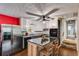 Modern kitchen featuring stainless steel appliances and a central island with seating at 230 King Arthur Dr, Woodstock, GA 30189