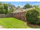 This home has a beautiful backyard with a well manicured lawn and privacy fence at 2785 Fontainebleau Dr, Dunwoody, GA 30360