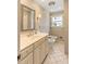 Bathroom featuring vanity, toilet, bidet, and window at 2785 Fontainebleau Dr, Dunwoody, GA 30360