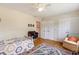Bedroom featuring wood floors, ceiling fan, and closet at 2785 Fontainebleau Dr, Dunwoody, GA 30360