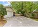 Long driveway with basketball hoop at 2785 Fontainebleau Dr, Dunwoody, GA 30360