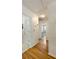 Hallway with hardwood floors leading to a bathroom at 2785 Fontainebleau Dr, Dunwoody, GA 30360