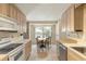 Bright eat-in kitchen with white appliances, ample counter space, and great natural light at 2785 Fontainebleau Dr, Dunwoody, GA 30360