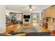 Spacious living room featuring hardwood floors, fireplace and seamless connection with outdoor area at 2785 Fontainebleau Dr, Dunwoody, GA 30360
