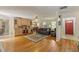Cozy living room with hardwood floors, built-in cabinets, and a comfortable seating area at 2785 Fontainebleau Dr, Dunwoody, GA 30360