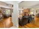 Comfortable living room with hardwood floors, and open view to a dining area at 2785 Fontainebleau Dr, Dunwoody, GA 30360