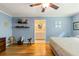 Light and airy main bedroom featuring wood floors and ensuite bathroom at 2785 Fontainebleau Dr, Dunwoody, GA 30360