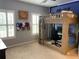 Well-lit bedroom with a custom loft bed and desk, perfect for study and relaxation at 970 Tarpley Nw Rd, Kennesaw, GA 30152