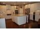 Spacious kitchen with a large island, white cabinets, and stainless steel appliances at 970 Tarpley Nw Rd, Kennesaw, GA 30152