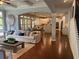 Inviting living room with coffered ceilings and an open layout to the dining and kitchen at 970 Tarpley Nw Rd, Kennesaw, GA 30152